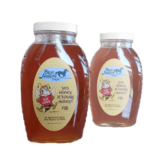Two jars of Blue Arrow Farm honey